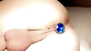 Twink helter-skelter tight balls puts butt plug regarding tight crevice