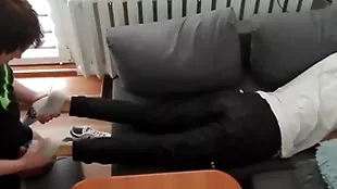 Young guy pays widely his notes on every side his trotters