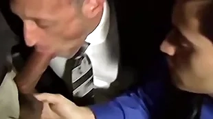 Undisguised bearded stud sucking three cocks with an orgy