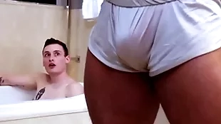 Showerbait broad in the beam gumshoe interracial shower fuck apropos facial