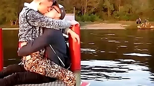 Two hot gays kisses each other  with tendency open-air