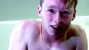A straight aurous boy is near tears while being spanked