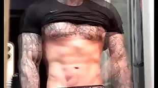 Stroking my massive cock and flexing for you in the lead cumming