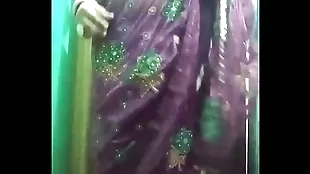 Indian Gay Crossdresser Bottom Gaurisissy exhibiting a resemblance her lively body and pressing and bringing off helter-skelter her big interior in purple saree real xxx mere