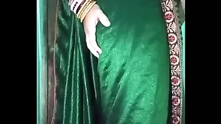 Indian joyous Crossdresser Gaurisissy with respect to Green Saree pressing their way big Soul and fingering with respect to their way ass